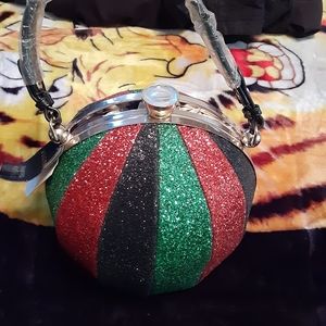 Red black and green roung handbag